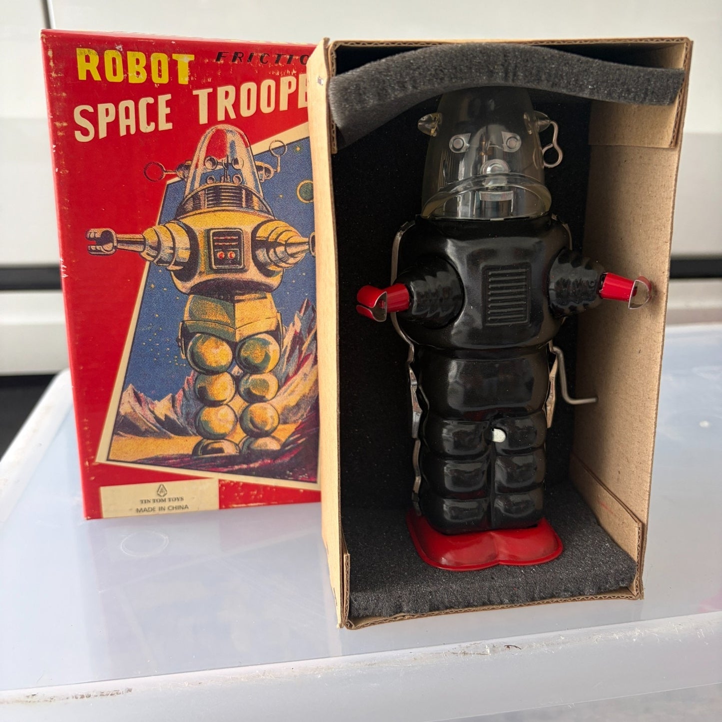 TR2018 Black Robot Space Trooper Friction Crank Tin Robot 7" Tall